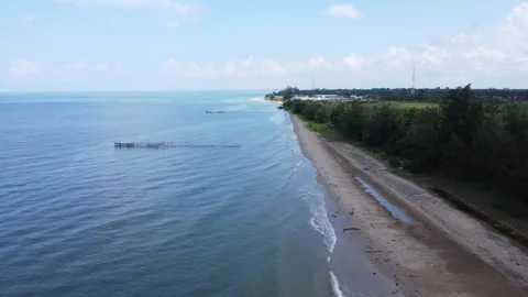 The view of the coastline with white sand is a nice place to relax Stock Footage 275674105