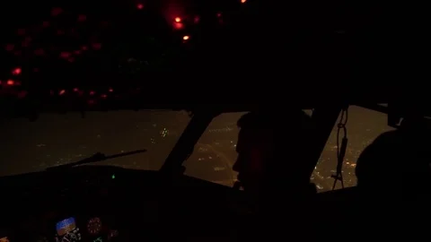 View from cockpit of pilot flying KC-135 Stratotanker over Iraq at night Stock Footage 92164820