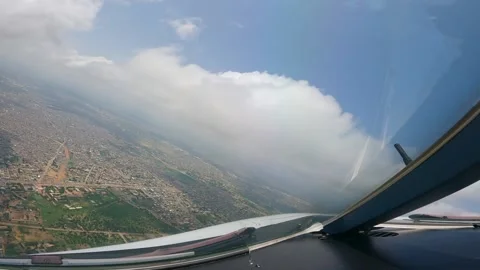 View from cockpit while flying cloudy Stock Footage 229365787