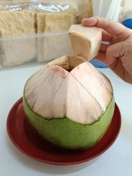 View of coconut fruit on the table Stock Photos