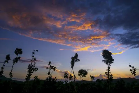 View of Colorful dramatic sky sunset or sunrise with clouds background Stock Photos