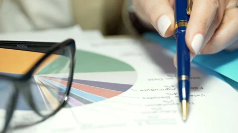 View of colorful graphs being checked by someone Stock-Footage 62354929