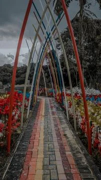 View of Colorful Pathway with Rainbow Bricks and Arches Stock Photos