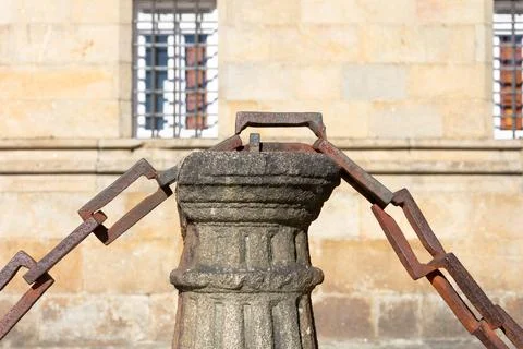 View of a Column with a chain Stock Photos
