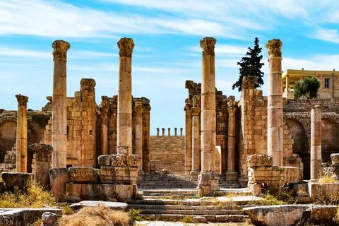 View of columns and one of the monumental gates of the Temple of Artemis. Jerash Stock Photos