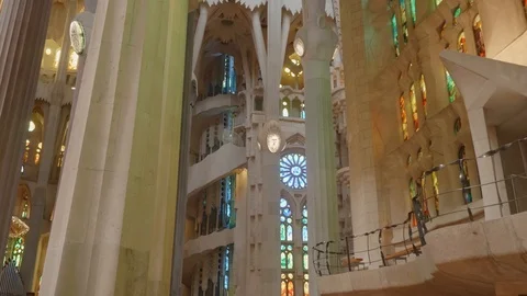 View of columns fanciful decorations and stained-glass windows on walls Stock Footage 117161254
