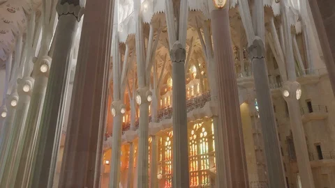 View of columns fanciful decorations on walls and ceiling, stained-glass windows Stock Footage 117160538