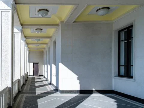 View of the columns in the gallery in an unknown building. Stock Photos