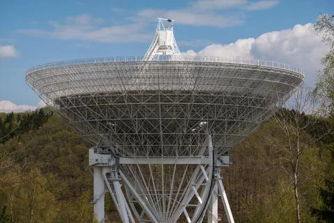 View of Communications Tower Against Cloudy Sky Stock Photos