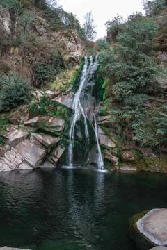 View of a complete waterfall in a forest Stock Photos