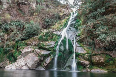 View of a complete waterfall in a forest Stock Photos