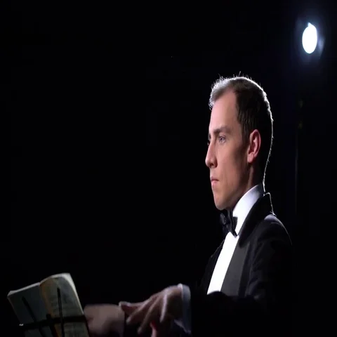 View on conductor during performance of orchestra Stock-Footage 69643454