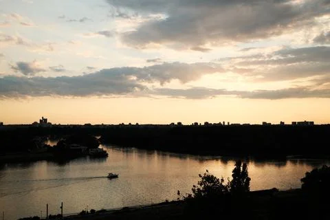 View of the confluence of the Sava and Danube rivers at sunset in Belgrade. C Stock Photos