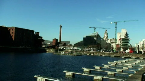 View of construction cranes across dock buildings Stock Footage 656409