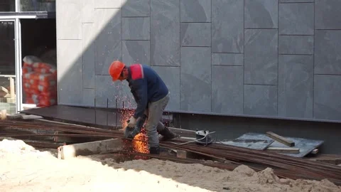 View of the construction site. A construction worker Stock Footage 294020789