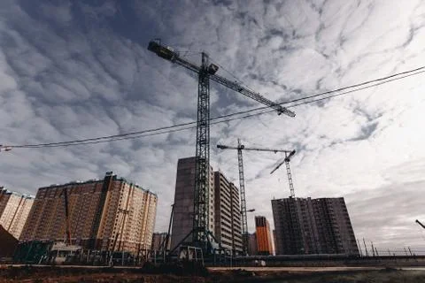 View of the construction site with cranes and high-rise residential buildings Stock-Fotos