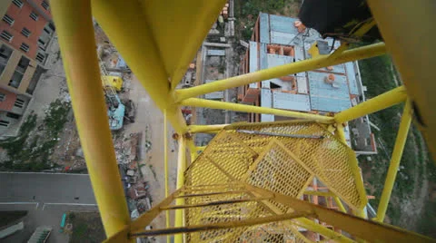 View of the construction site down the crane. Crane rotating axis Stock Footage 24309445