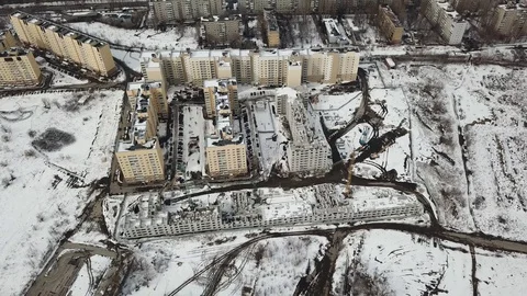 View of the construction site from a drone flying in an arc Video stock 128829210