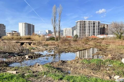 View of construction site, empty abandoned plot of land with construction was Stock Photos