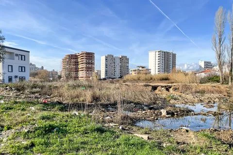 View of construction site, empty abandoned plot of land with construction was Stock Photos