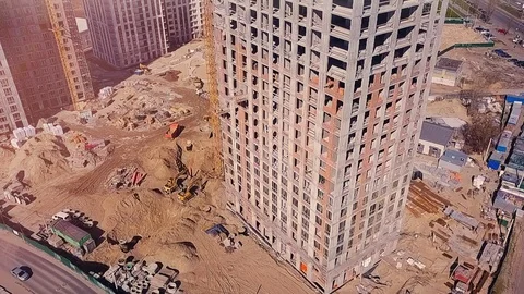A view of a construction site from a flying drone Stock Footage 126179424