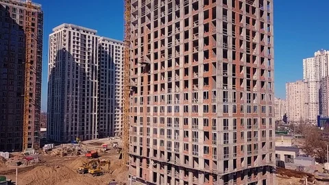 A view of a construction site from a flying drone Stock Footage 126179709