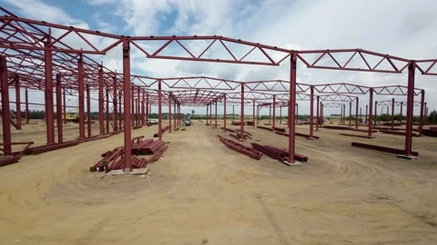 View of the construction site of a large factory Stock Footage 263746220