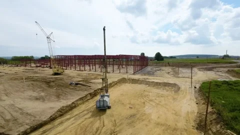 View of the construction site of a large factory Stock Footage 263746881