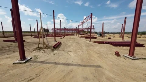 View of the construction site of a large factory Stock Footage 263792400