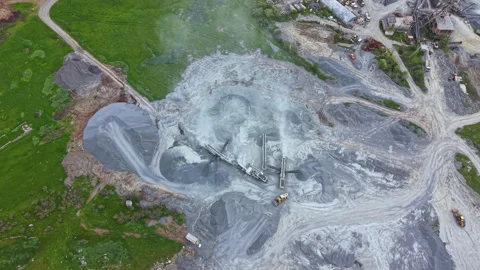 View of a construction site showing machinery at work on a gravel extraction Stock Footage 342481363
