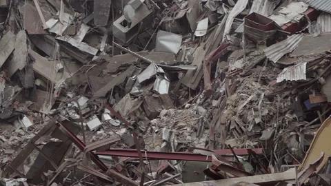 View of construction waste, concrete debris with reinforcement and pieces of  Stock Footage 121229076