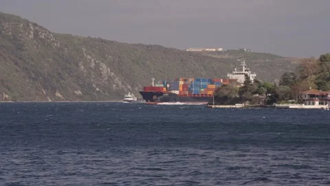 View of a container ship navigating the Bosphorus, Turkiye. Stock-Footage 343880342
