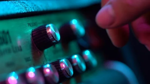 View of the control panel on a guitar amplifier. Tumblers, knobs and buttons 스톡 동영상 105085510