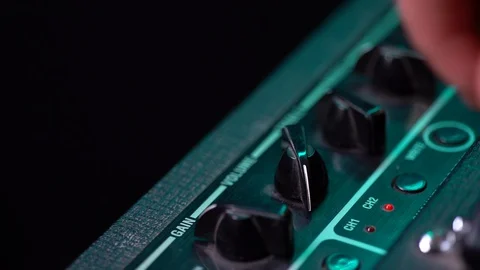 View of the control panel on a guitar amplifier. Tumblers, knobs and buttons 스톡 동영상 105094676