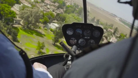 View At Control System, Pilot Hold Lever Of Helicopter. Camera Inside. Pilot Stock Footage 80387469