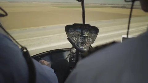 View At Control System, Pilot Hold Lever Of Helicopter. Camera Inside. Pilot Stock Footage 80387495