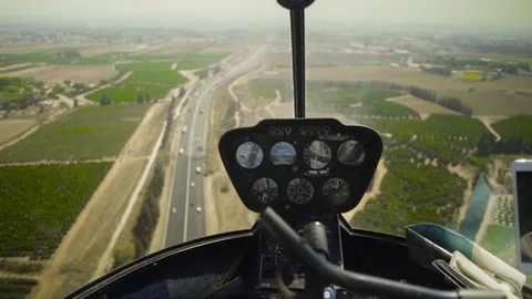 View At Control System, Pilot Hold Lever Of Helicopter. Camera Inside. Pilot Stock Footage 80391702