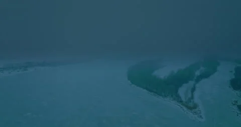 View from the copter, a snow cyclone over the countryside. Snowfall is gathering Stock Footage 195970712