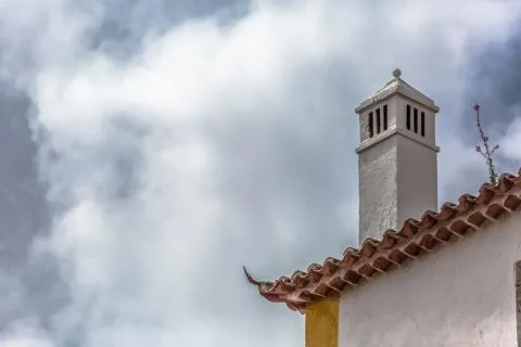 View of cornice and upper corner of building facade, traditional chimney Stock Photos