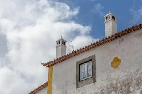 View of cornice and upper corner of building facade, traditional chimney Stock Photos