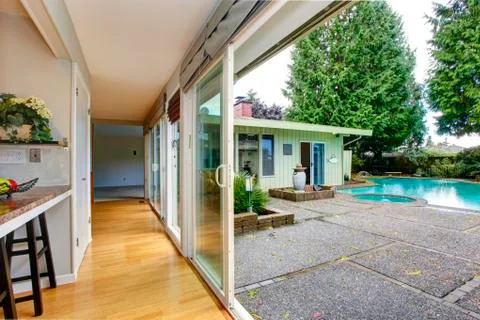 View of corridor and walkout deck to backyard Stock Photos