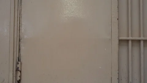 View of the corridor with prison cells. camera moves from bottom to top Stock Footage 120146431