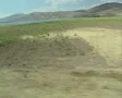 View of countryside and coast from moving train SD Footage