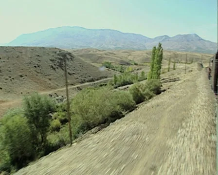 View of countryside from moving train Stock Footage 8522809