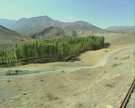 View of countryside from moving train Stock Footage 8522824