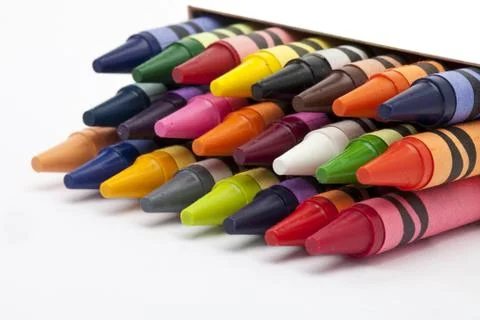 View of crayons stacked on white background Stock Photos