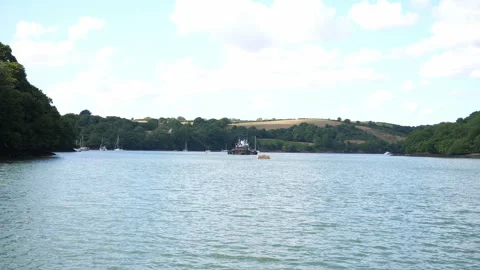 View crossing wide Cornish river Seq A Pt2 of 6 Stock Footage 240703306