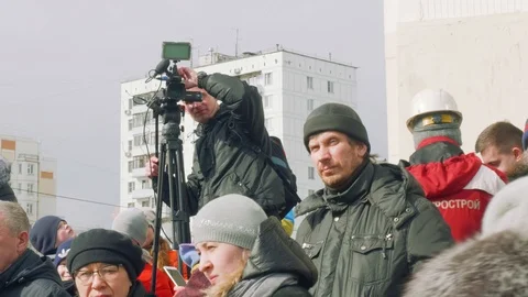 View of crowd and camera man at ceremony... | Stock Video | Pond5