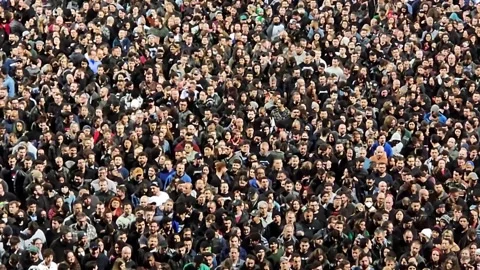View of a crowd of people walking slowly Stock Footage 193532290