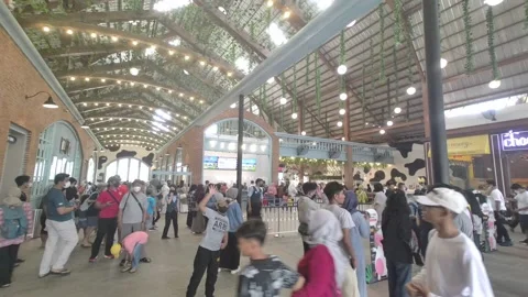 View of crowds of people in a hall to queue to buy entrance tickets Stock Footage 228764290
